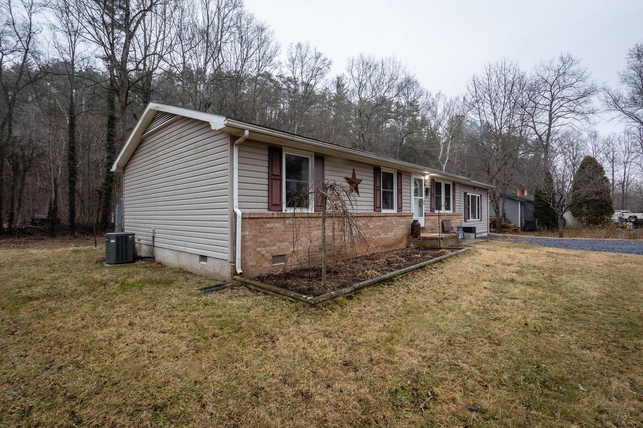 8448 Briery Branch Road Dayton, VA 22821 - Photo 28 of 37 a view of a house with a yard
