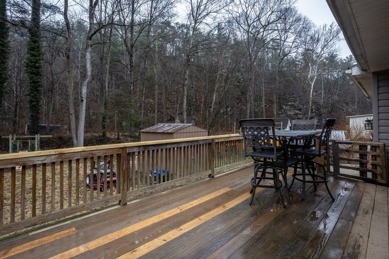 8448 Briery Branch Road Dayton, VA 22821 - Photo 33 of 37 a view of a dinning table and chairs on the roof deck