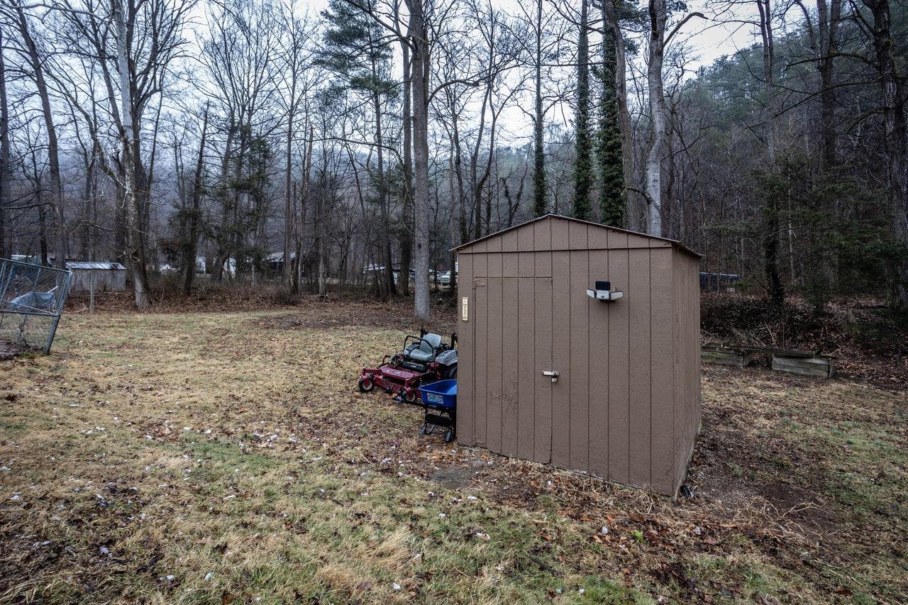 8448 Briery Branch Road Dayton, VA 22821 - Photo 36 of 37 a backyard of a house with lots of green space