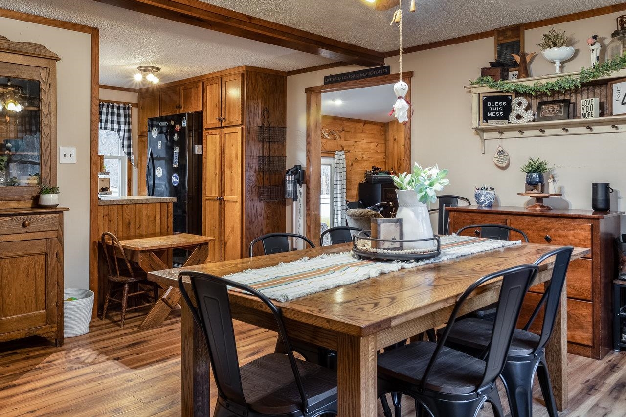 8448 Briery Branch Road Dayton, VA 22821 - Photo 7 of 37 a view of a dining room with furniture and wooden floor