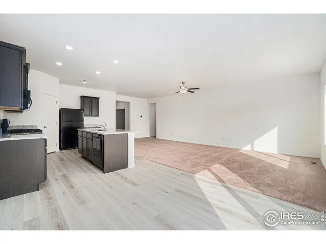 a view of kitchen with wooden floor