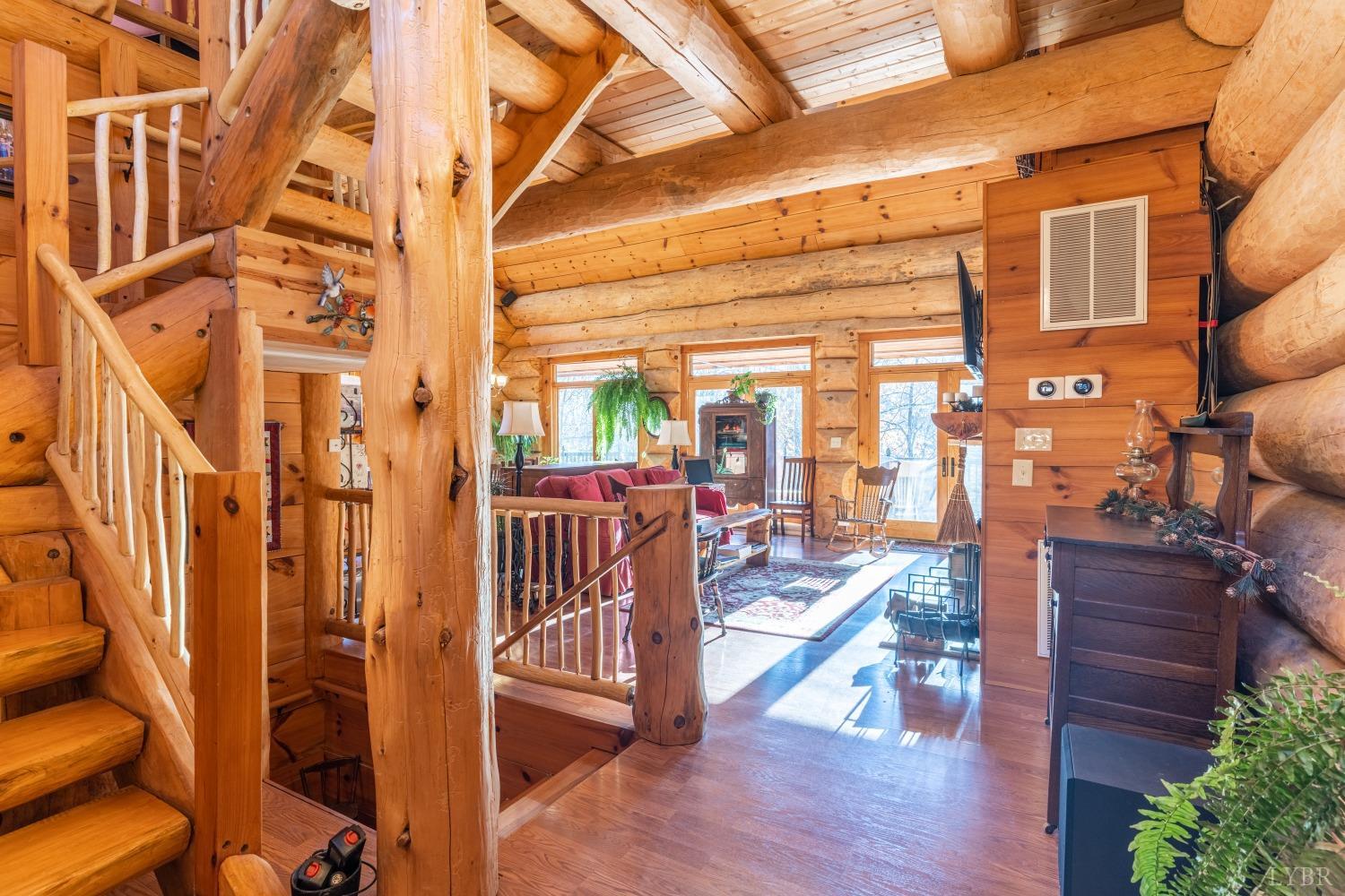 1151 Mt Horeb Road Amherst, VA 24521 - Photo 15 of 98 a view of a balcony with wooden floor and furniture