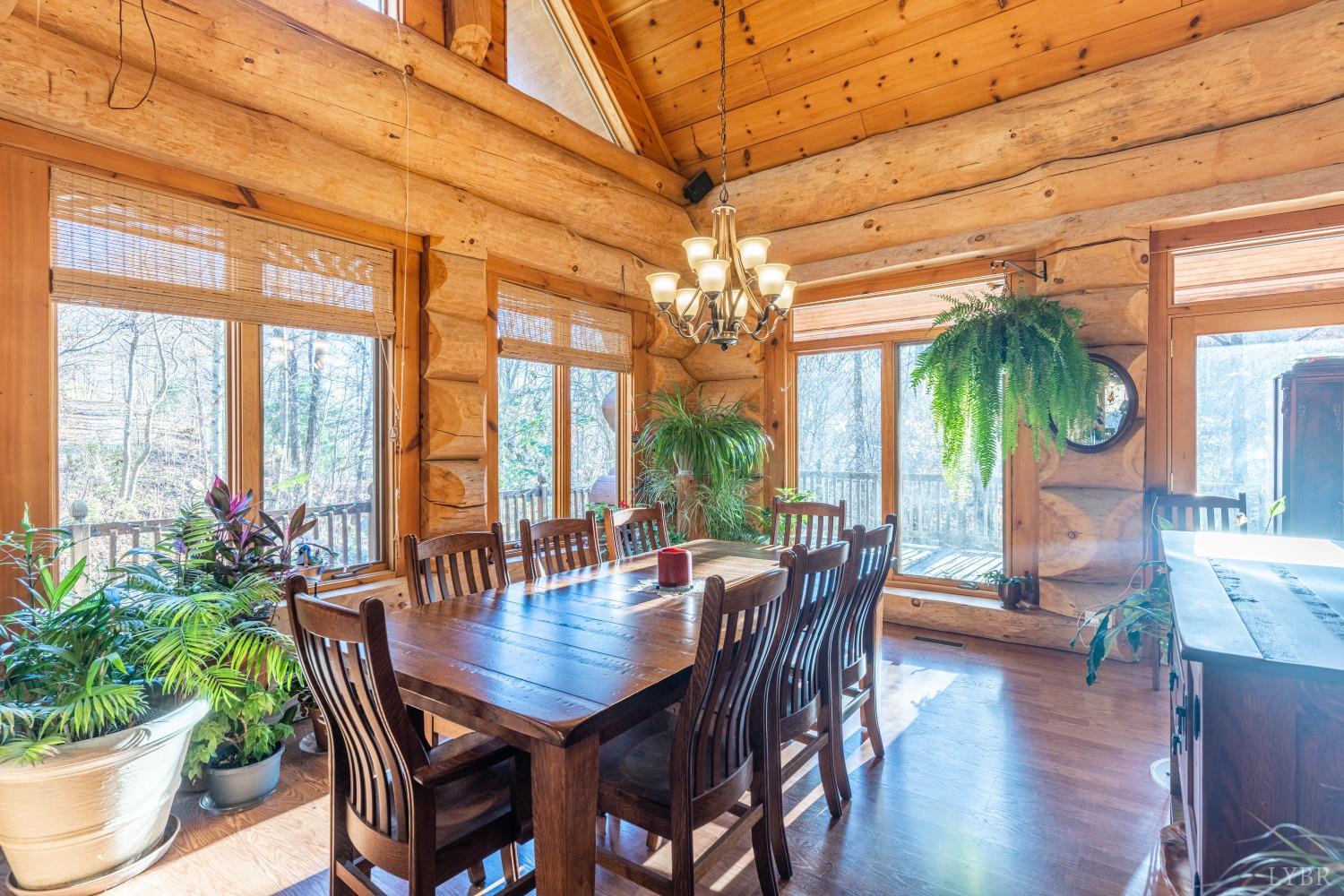 1151 Mt Horeb Road Amherst, VA 24521 - Photo 18 of 98 a view of a dining room with furniture window and wooden floor