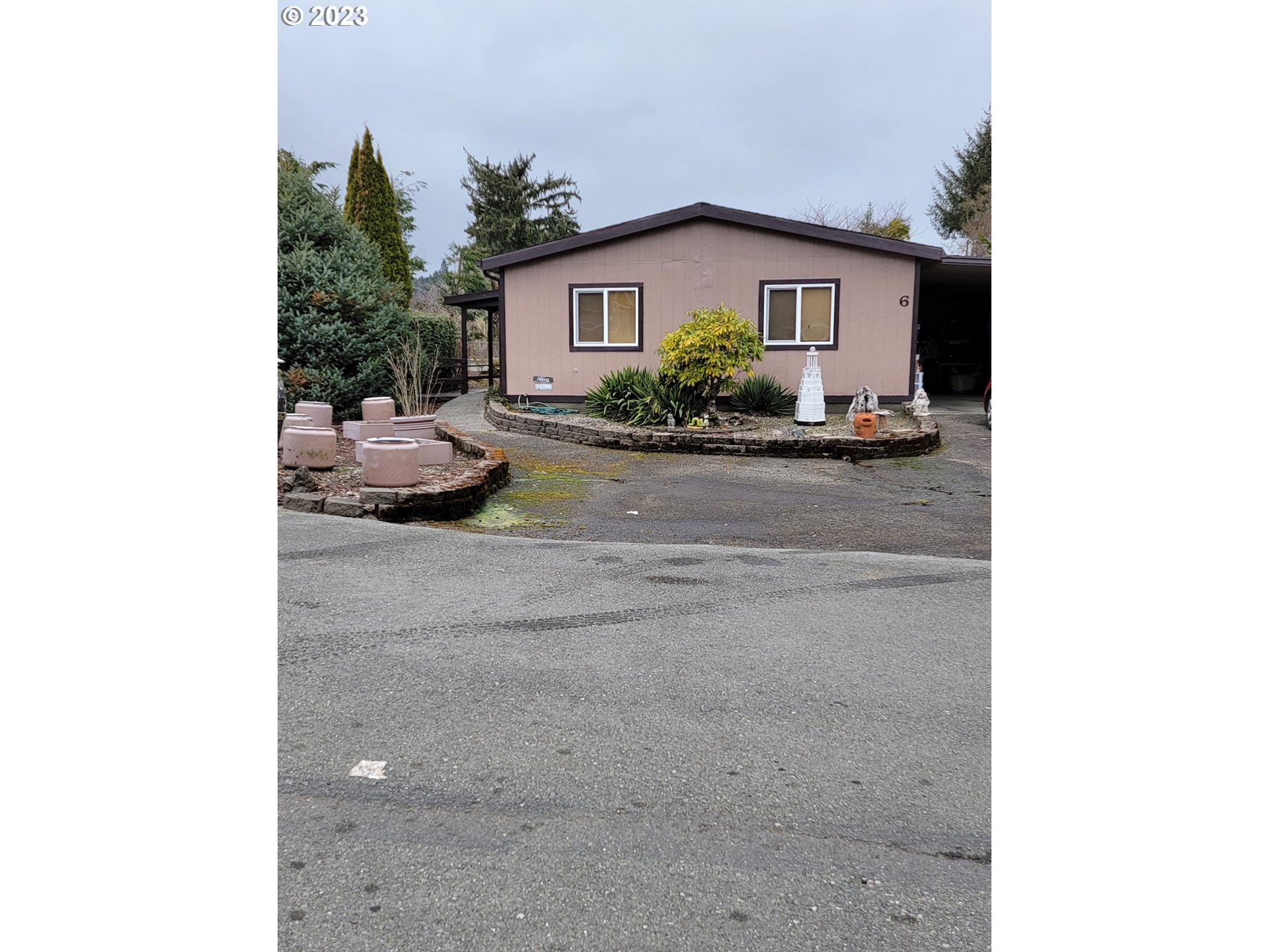 100 River Bend Road, Unit 6 Reedsport, OR 97467 - Photo 1 of 26 a house view with a outdoor space