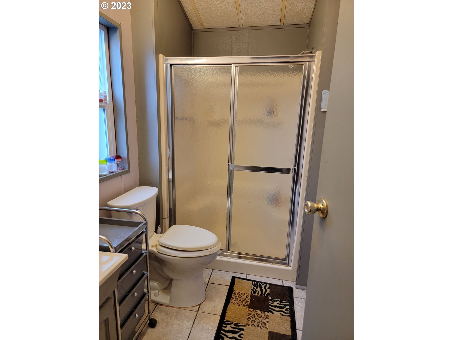 100 River Bend Road, Unit 6 Reedsport, OR 97467 - Photo 8 of 26 a bathroom with a sink and a toilet