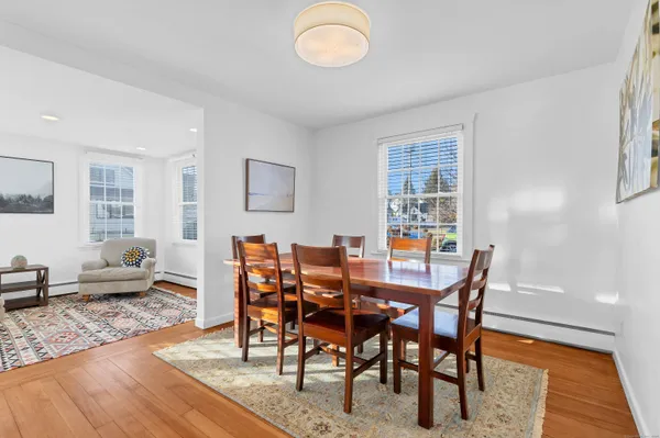 a living room with furniture and windows