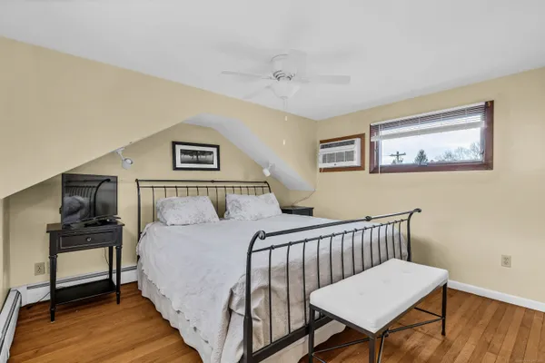 a bathroom with a sink a mirror and shower