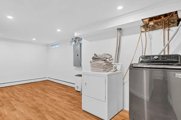 a very nice looking room with wooden floor