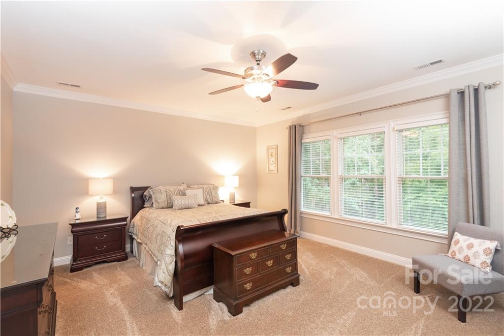 110 Mills Lane Fort Mill, SC 29708 - Photo 16 of 37 a bedroom with a bed and window