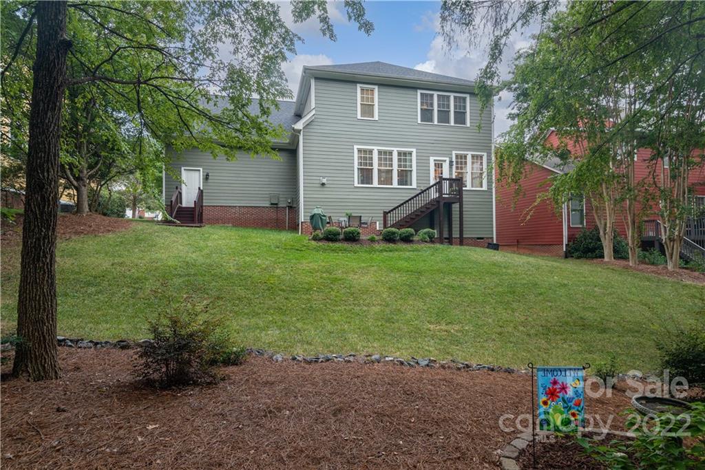 110 Mills Lane Fort Mill, SC 29708 - Photo 25 of 37 a backyard of a house with seating space