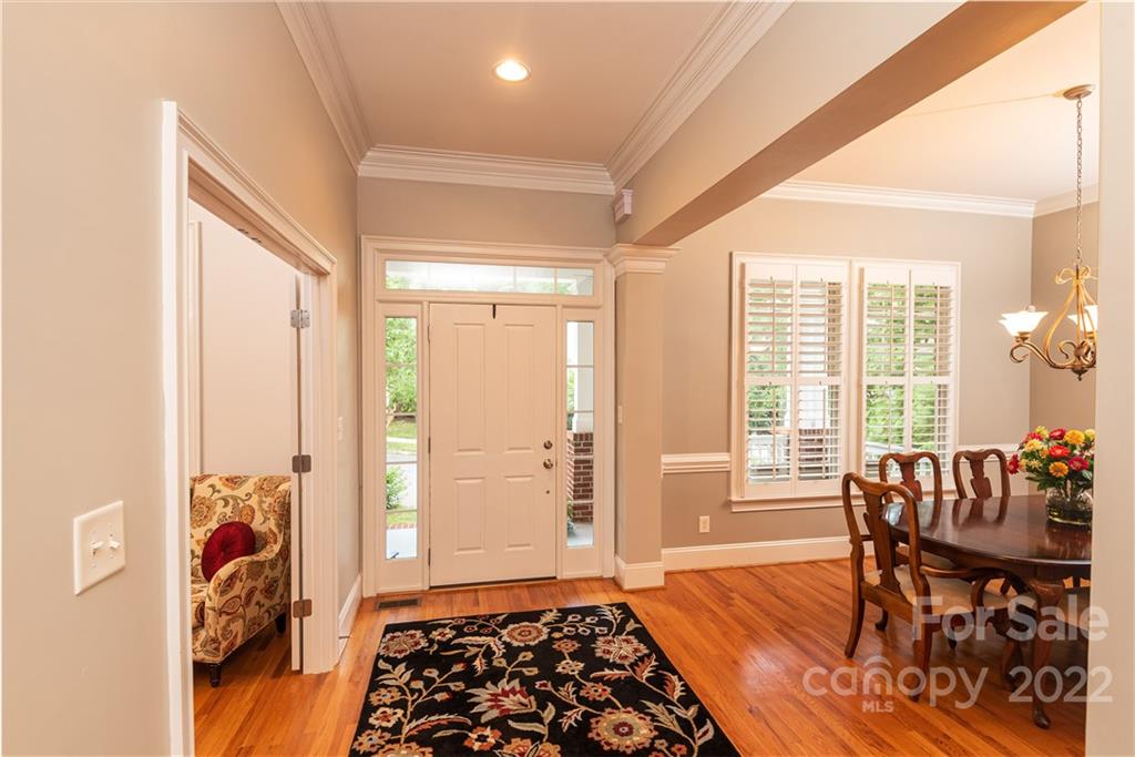 110 Mills Lane Fort Mill, SC 29708 - Photo 5 of 37 a bedroom with furniture window and wooden floor