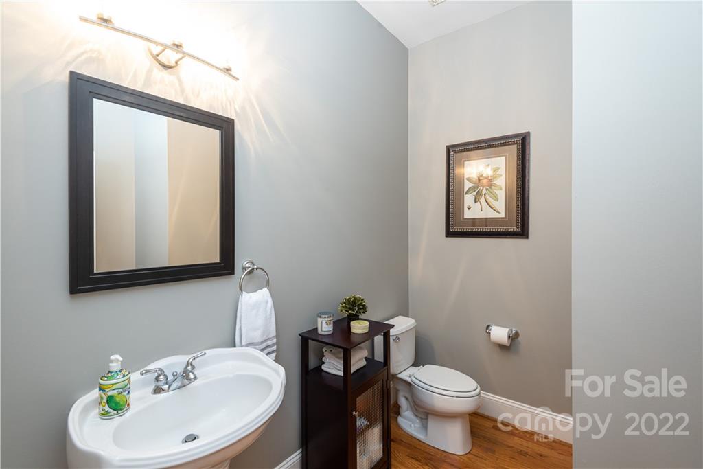 110 Mills Lane Fort Mill, SC 29708 - Photo 8 of 37 a bathroom with a toilet a sink and mirror