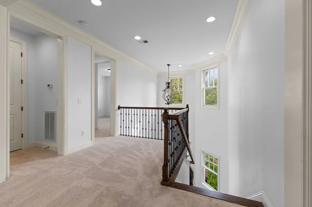 a view of house with backyard and garden