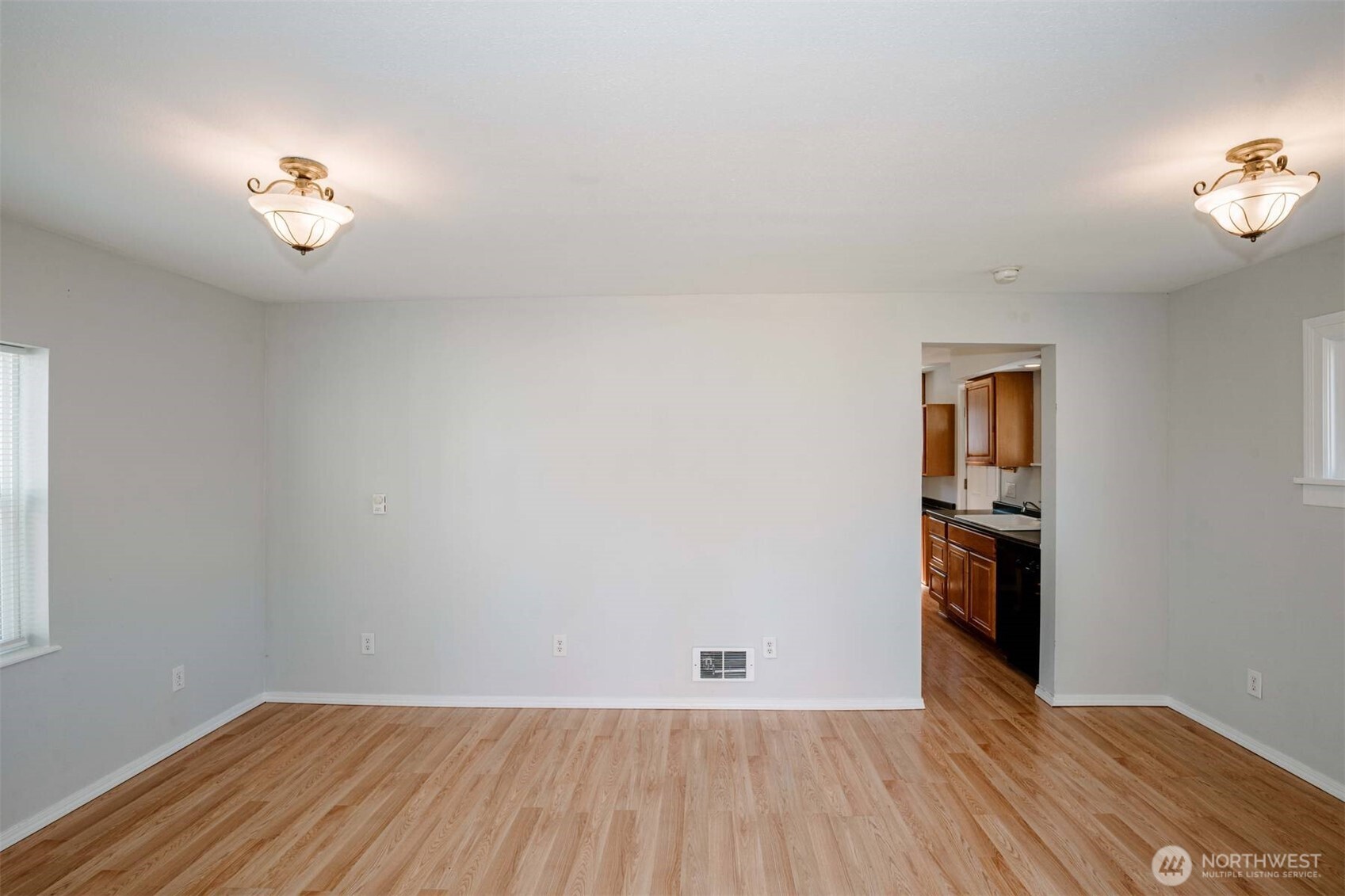 2220 Summit Avenue Everett, WA 98201 - Photo 3 of 26 wooden floor in an empty room with a window