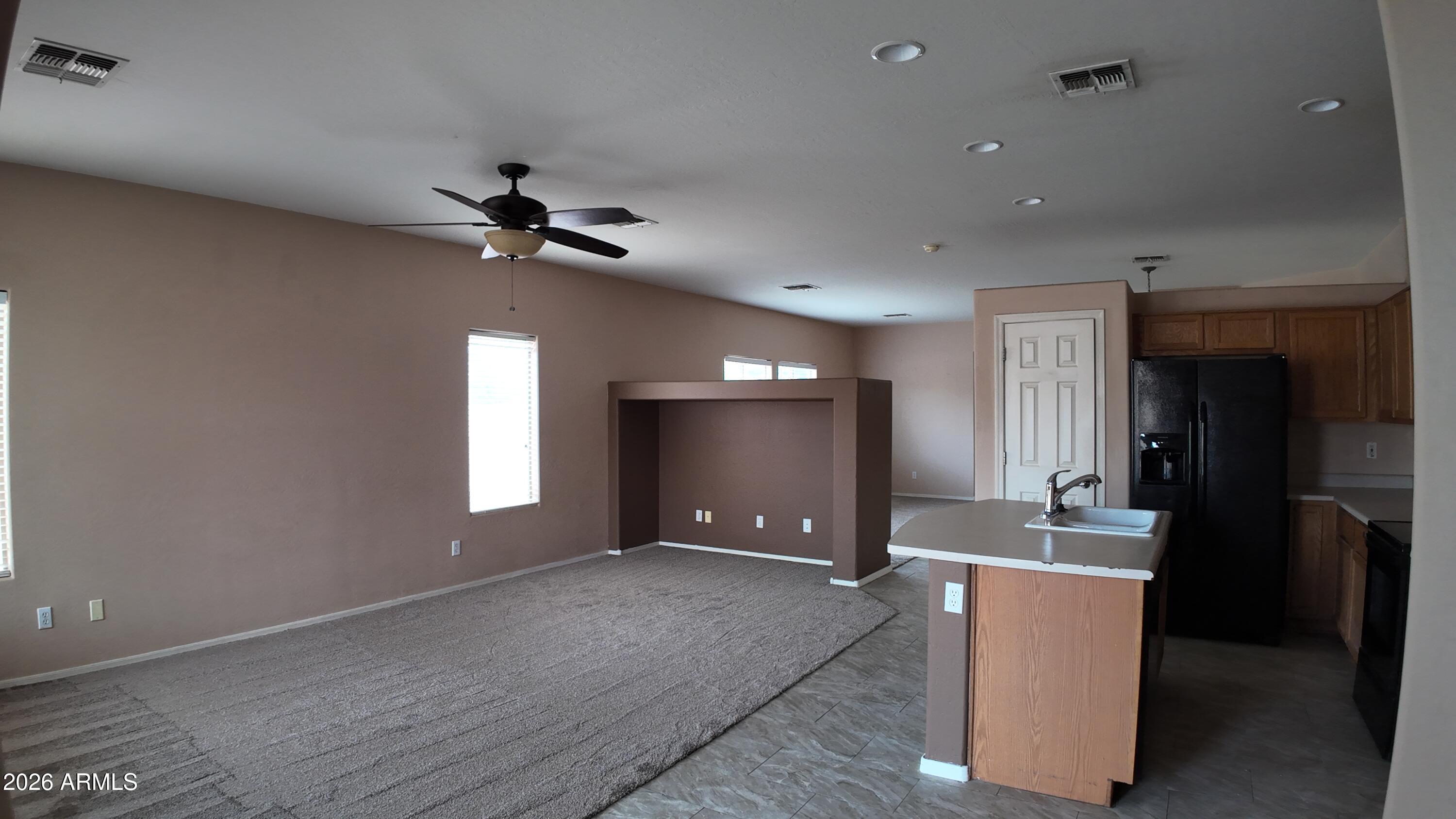 4614 West Cottontail Road Phoenix, AZ 85086 - Photo 9 of 14 Kitchen Overlooking Living Area