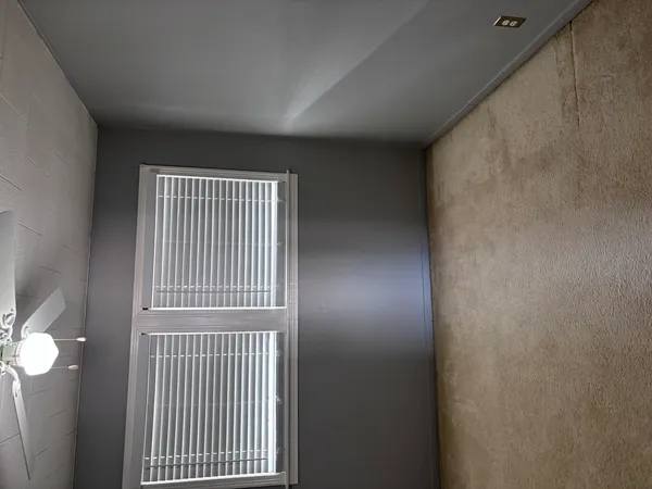 an empty room with a window