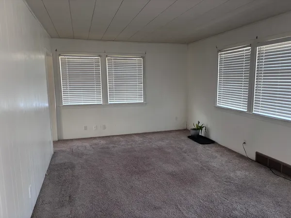 a view of room with gym equipment