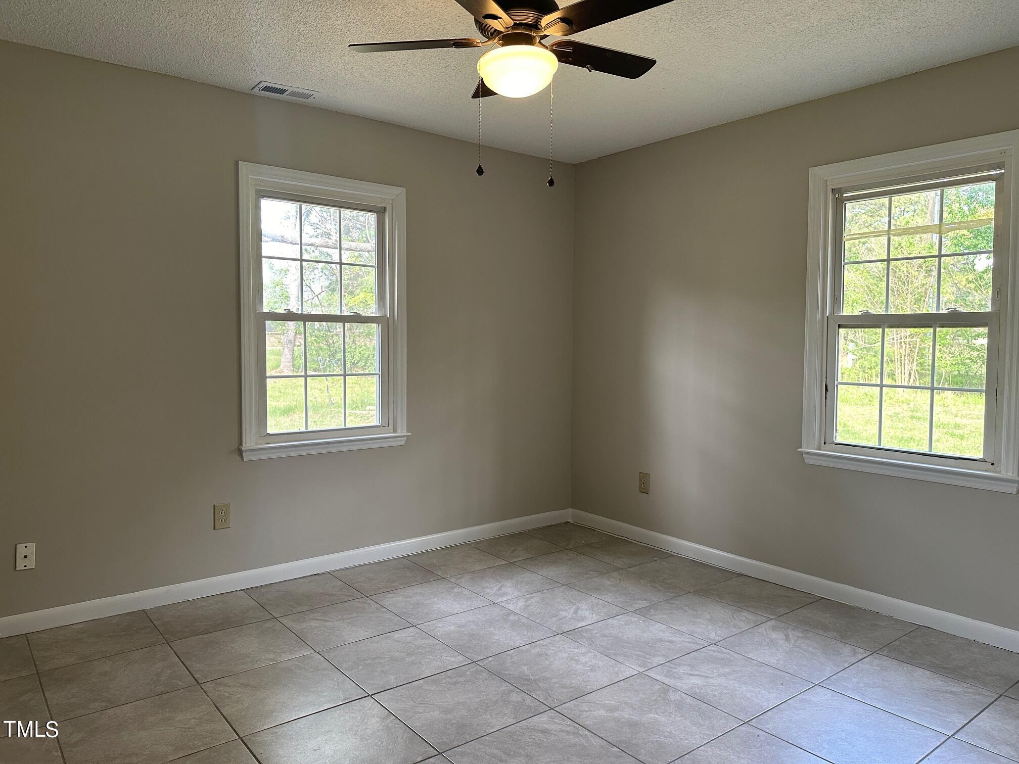 3309 Banks Road Raleigh, NC 27603 - Photo 11 of 11 a view of an empty room with a window