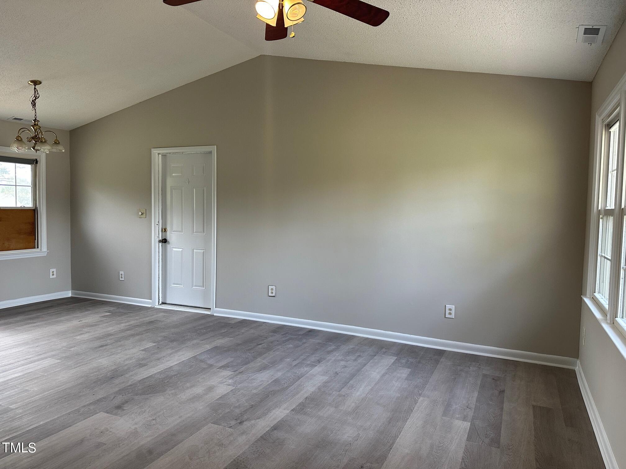 3309 Banks Road Raleigh, NC 27603 - Photo 7 of 11 an empty room with a window