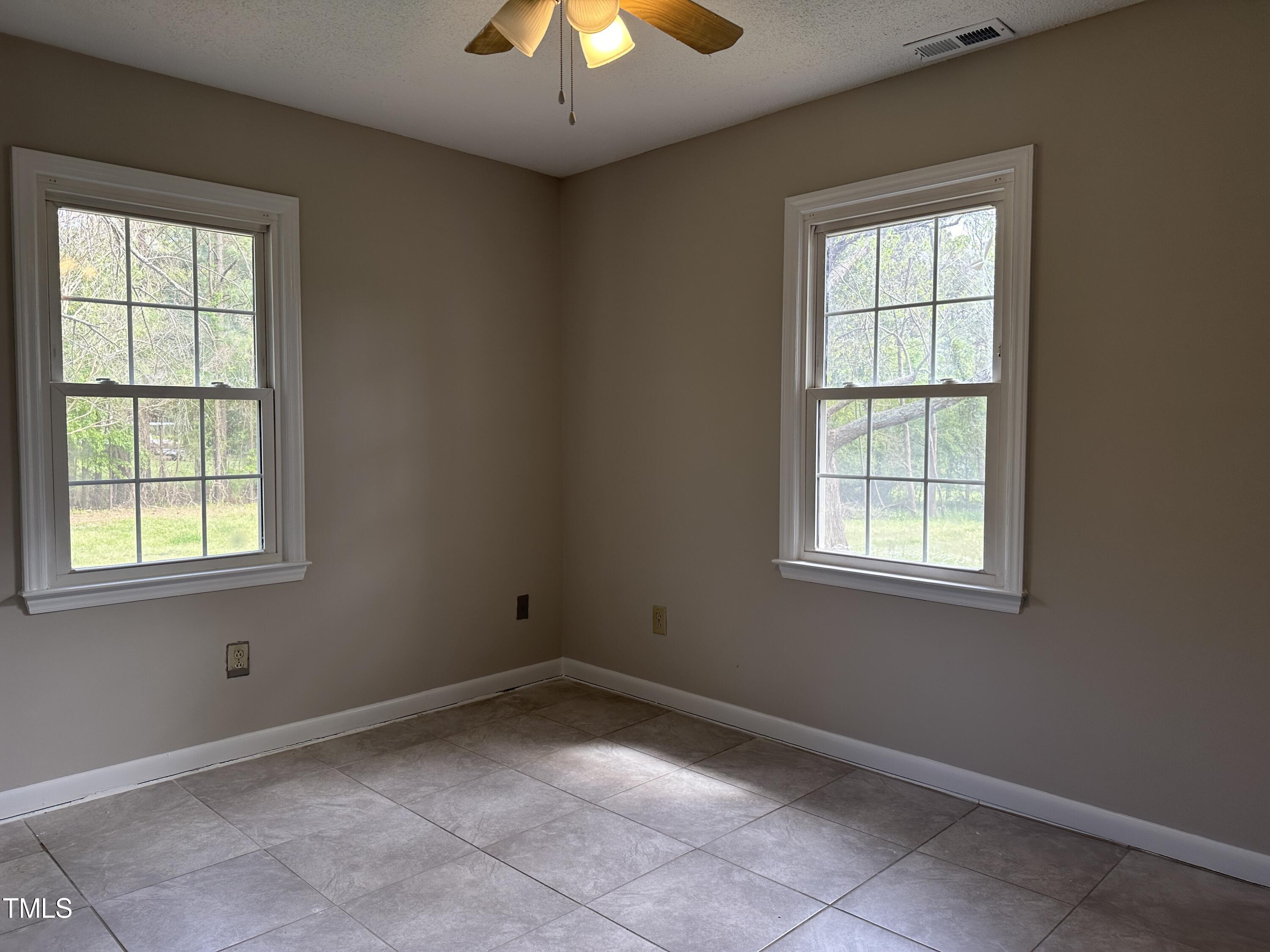 3309 Banks Road Raleigh, NC 27603 - Photo 9 of 11 an empty room with a window