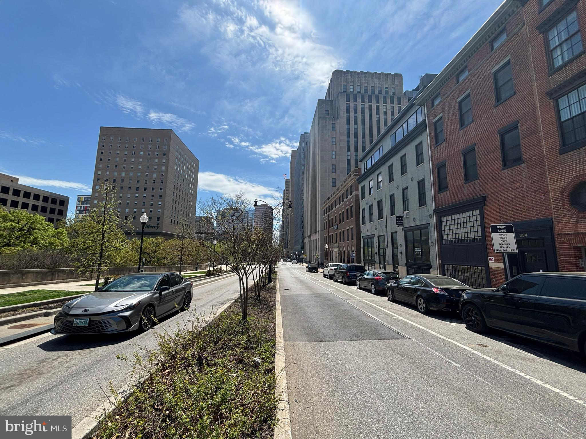 404 St Paul Street Baltimore, MD 21202 - Photo 14 of 17 a view of a street with cars parked