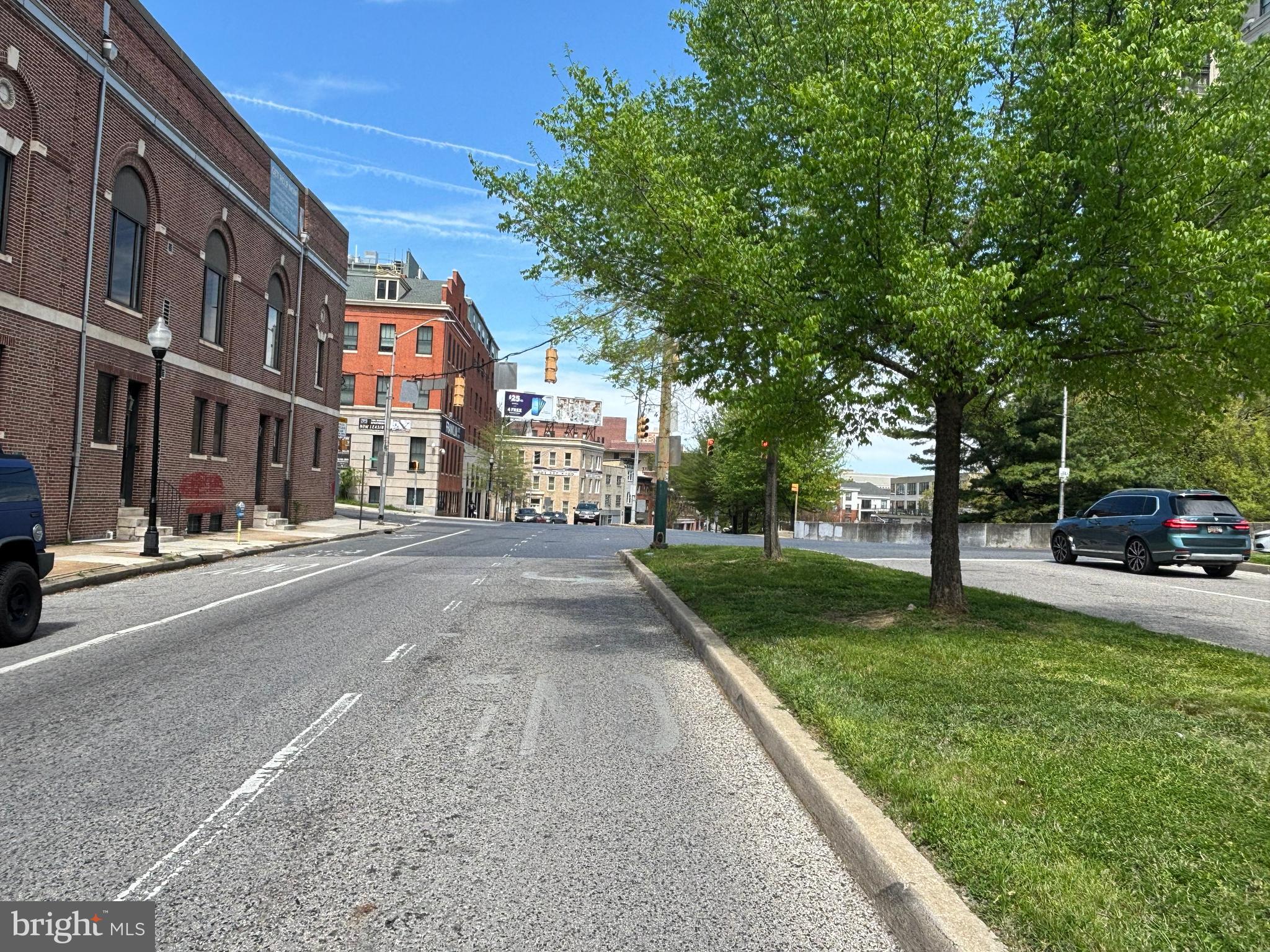 404 St Paul Street Baltimore, MD 21202 - Photo 17 of 17 a city street lined with tall buildings
