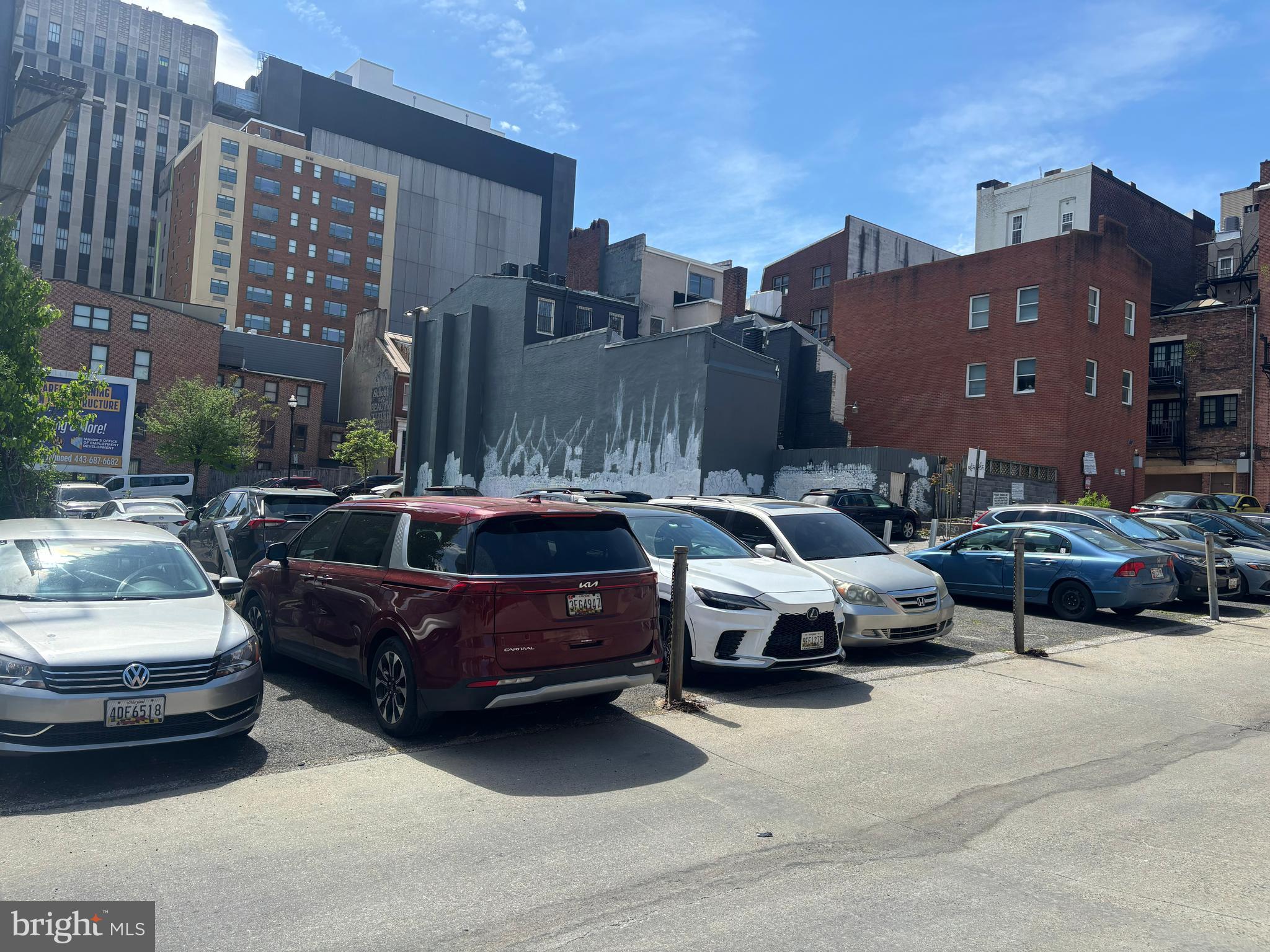 404 St Paul Street Baltimore, MD 21202 - Photo 6 of 17 a couple of cars parked in front of a building