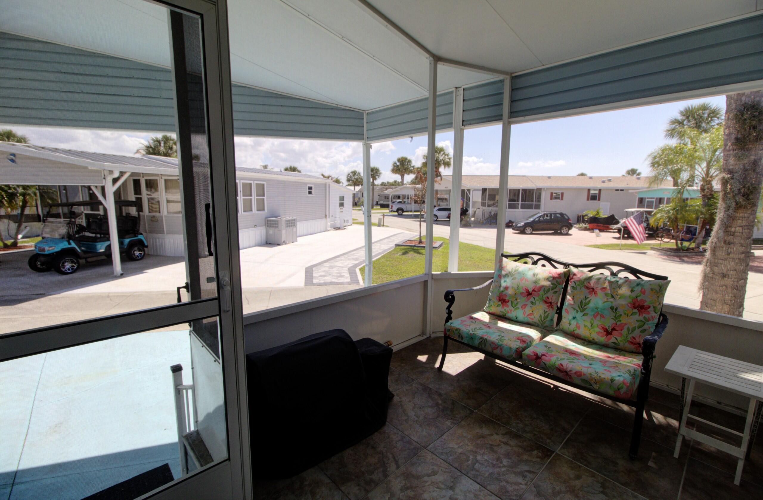 5395 Southeast 64th Terrace Okeechobee, FL 34974 - Photo 20 of 24 a room with furniture and a table