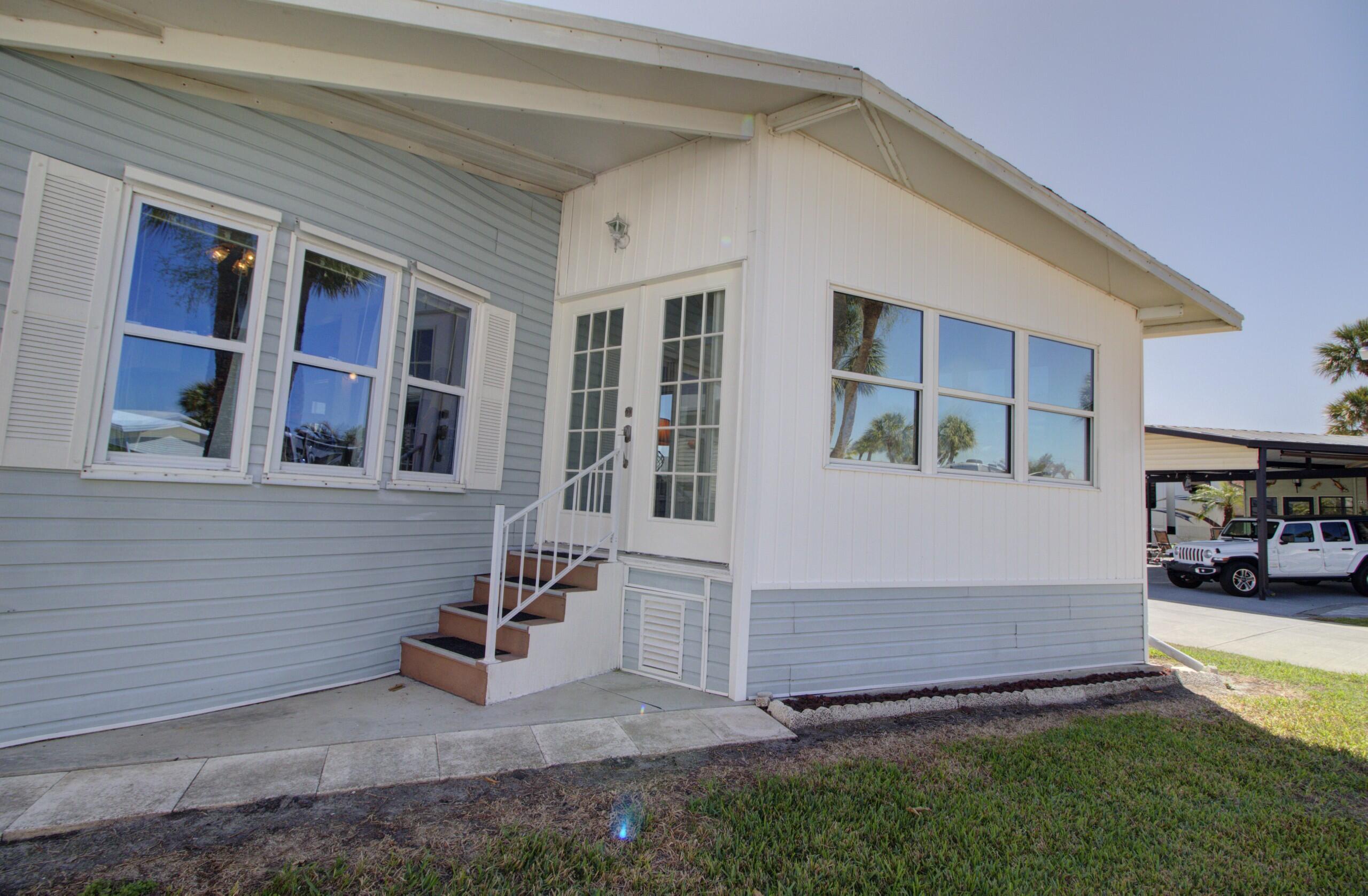 5395 Southeast 64th Terrace Okeechobee, FL 34974 - Photo 23 of 24 a view of house with yard