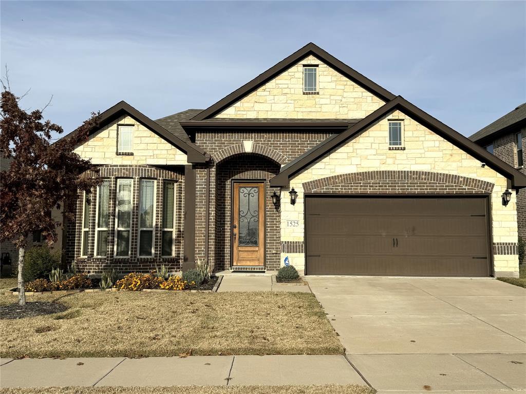 1525 Yellowthroat Drive Little Elm, TX 75068 - Photo 1 of 1 a view of entrance gate of the house