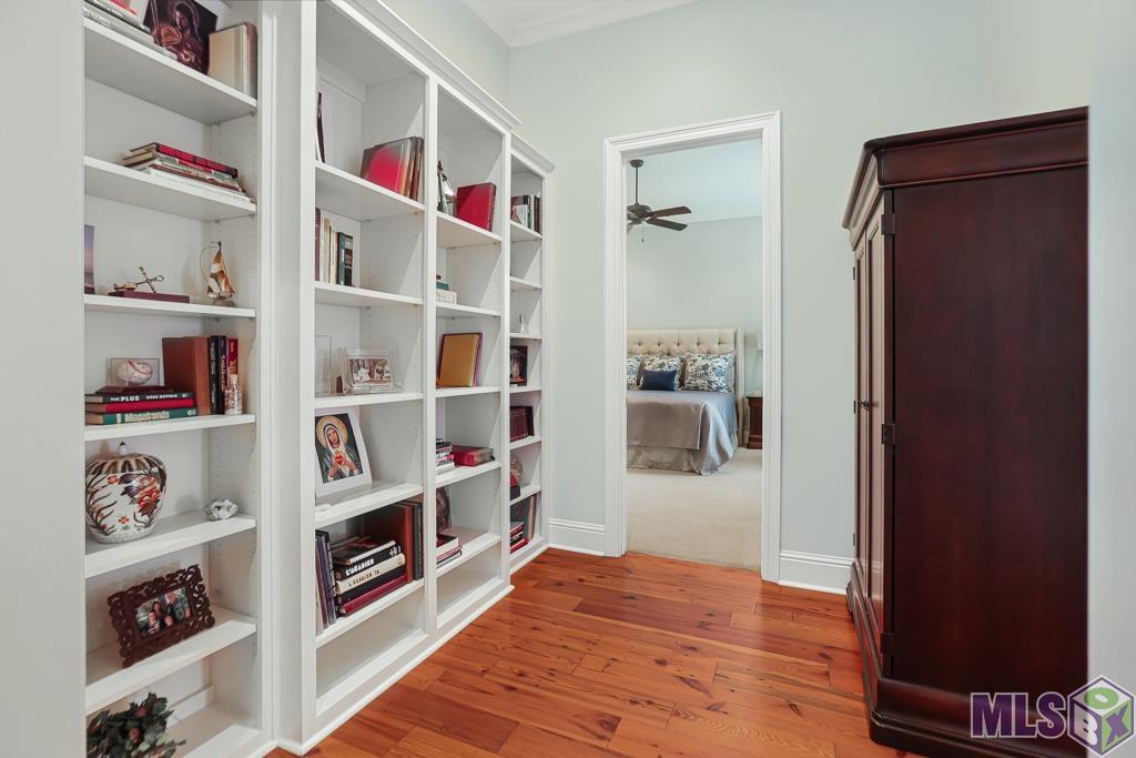 6304 Muir Street Baton Rouge, LA 70817 - Photo 22 of 36 BOOKCASE end of main hall