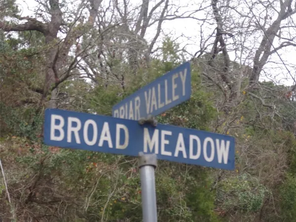 a street sign that is on a pole