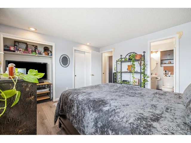 a bathroom with a sink mirror and vanity