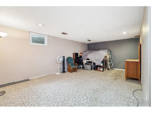 a view of a backyard with sitting area