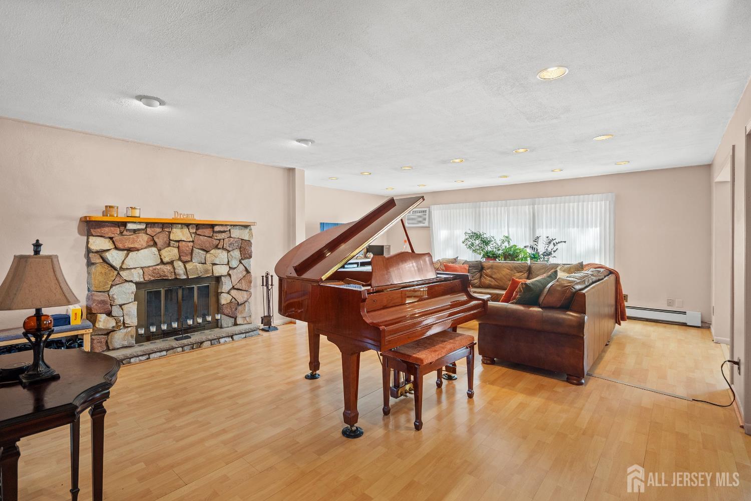 131 Woodland Road Piscataway, NJ 08854 - Photo 20 of 40 a living room with furniture and a wooden floor
