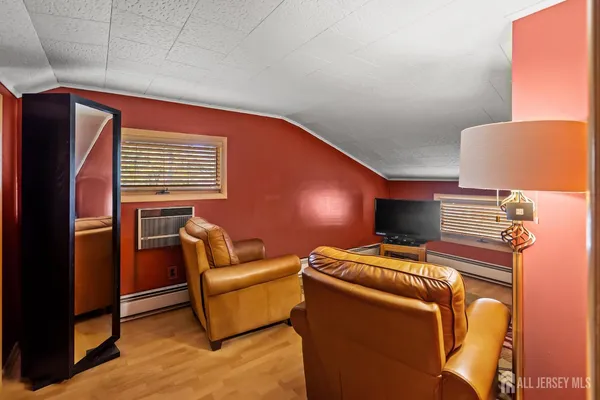 a livingroom with furniture and a window