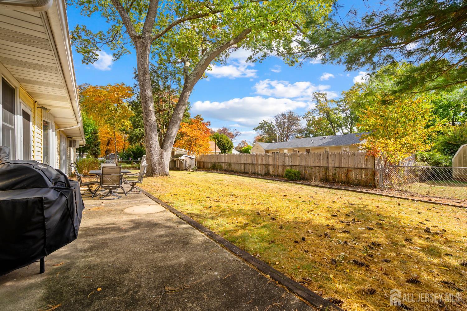 131 Woodland Road Piscataway, NJ 08854 - Photo 36 of 40 a view of a yard with trees