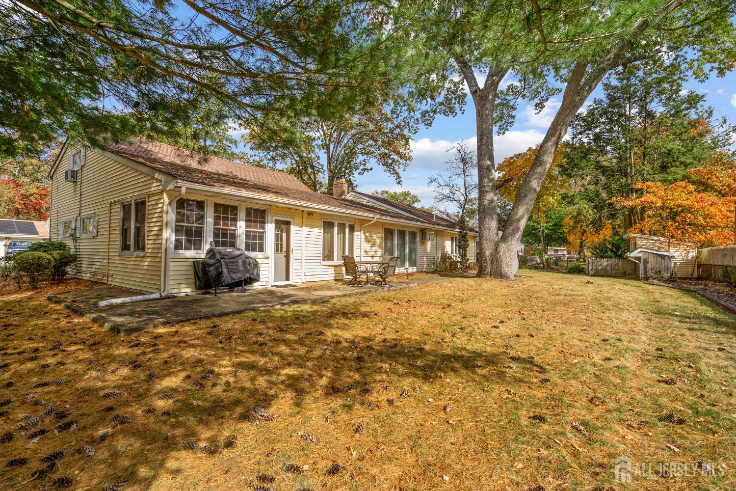 131 Woodland Road Piscataway, NJ 08854 - Photo 37 of 40 a front view of house with yard