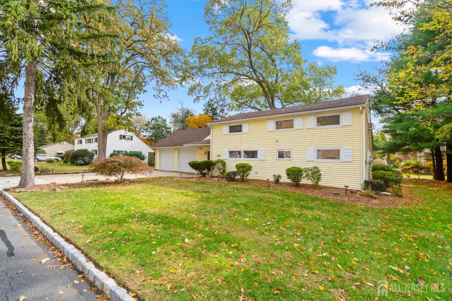 131 Woodland Road Piscataway, NJ 08854 - Photo 9 of 40 a view of a back yard of the house