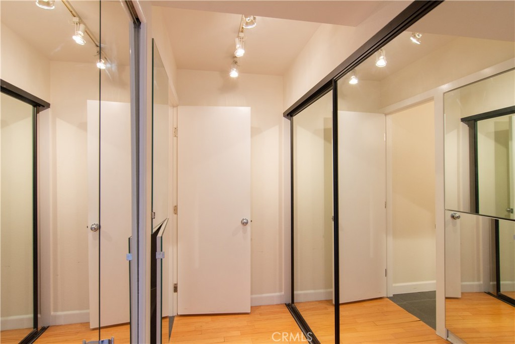 600 West 9th Street, Unit 1114 Los Angeles, CA 90015 - Photo 14 of 27 a bathroom with a shower and a glass door