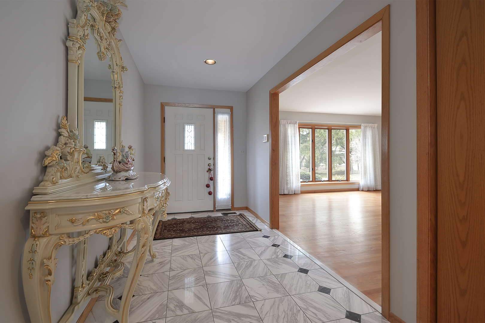 102 North Haman Road Inverness, IL 60010 - Photo 2 of 25 a spacious bathroom with a granite countertop sink a mirror and a bathtub