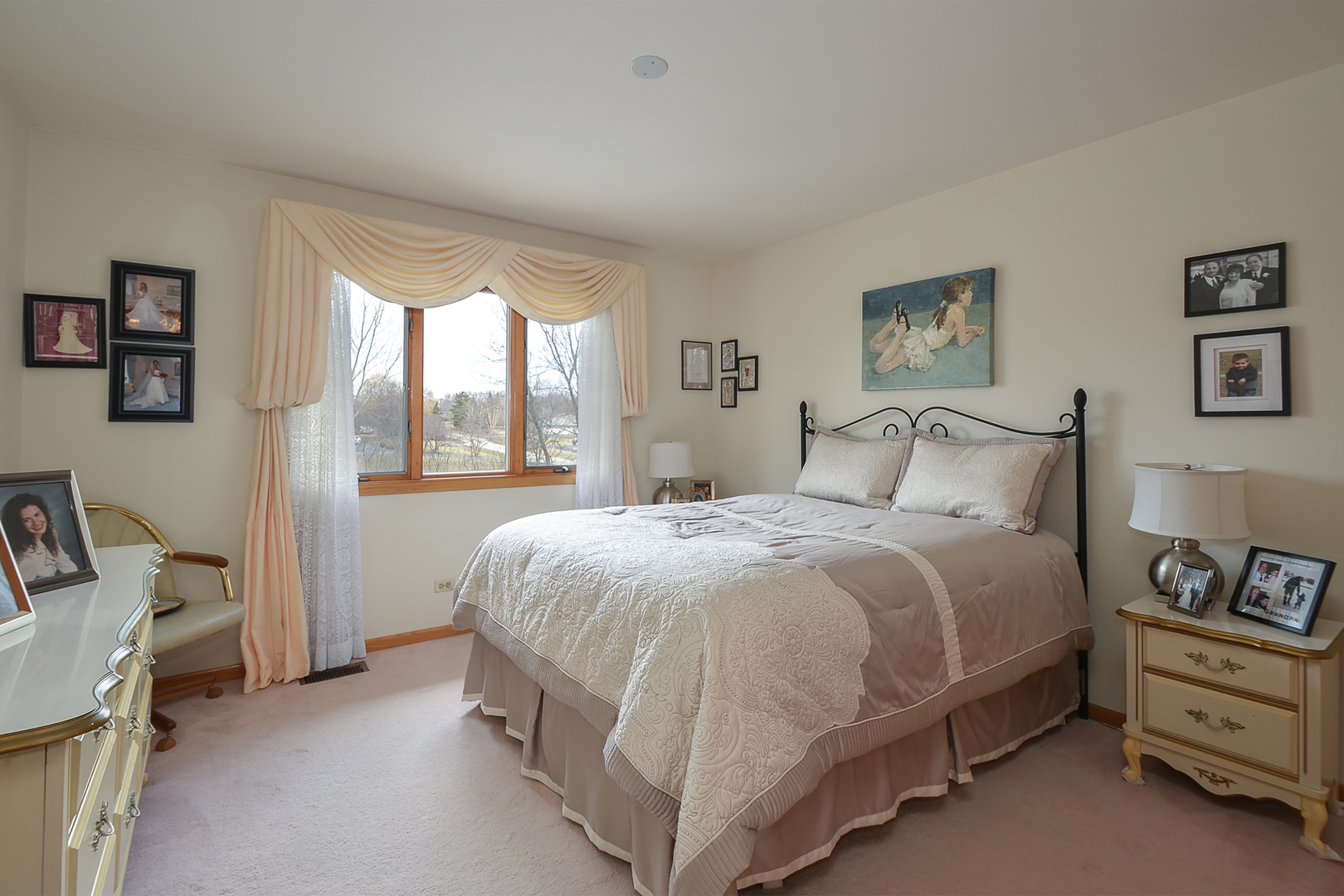 102 North Haman Road Inverness, IL 60010 - Photo 14 of 25 a bedroom with a bed and a window