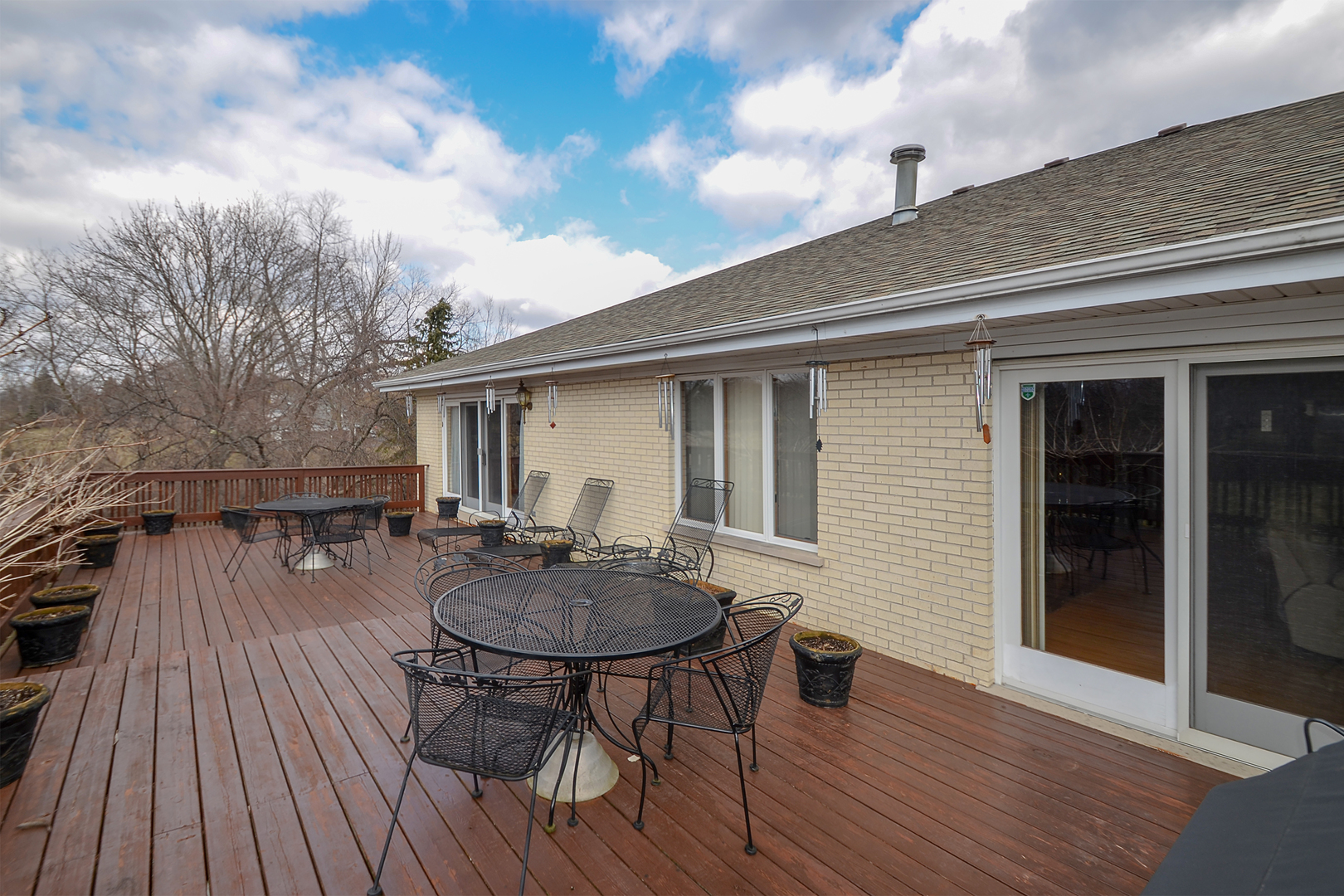 102 North Haman Road Inverness, IL 60010 - Photo 25 of 25 a roof deck with table and chairs and wooden floor