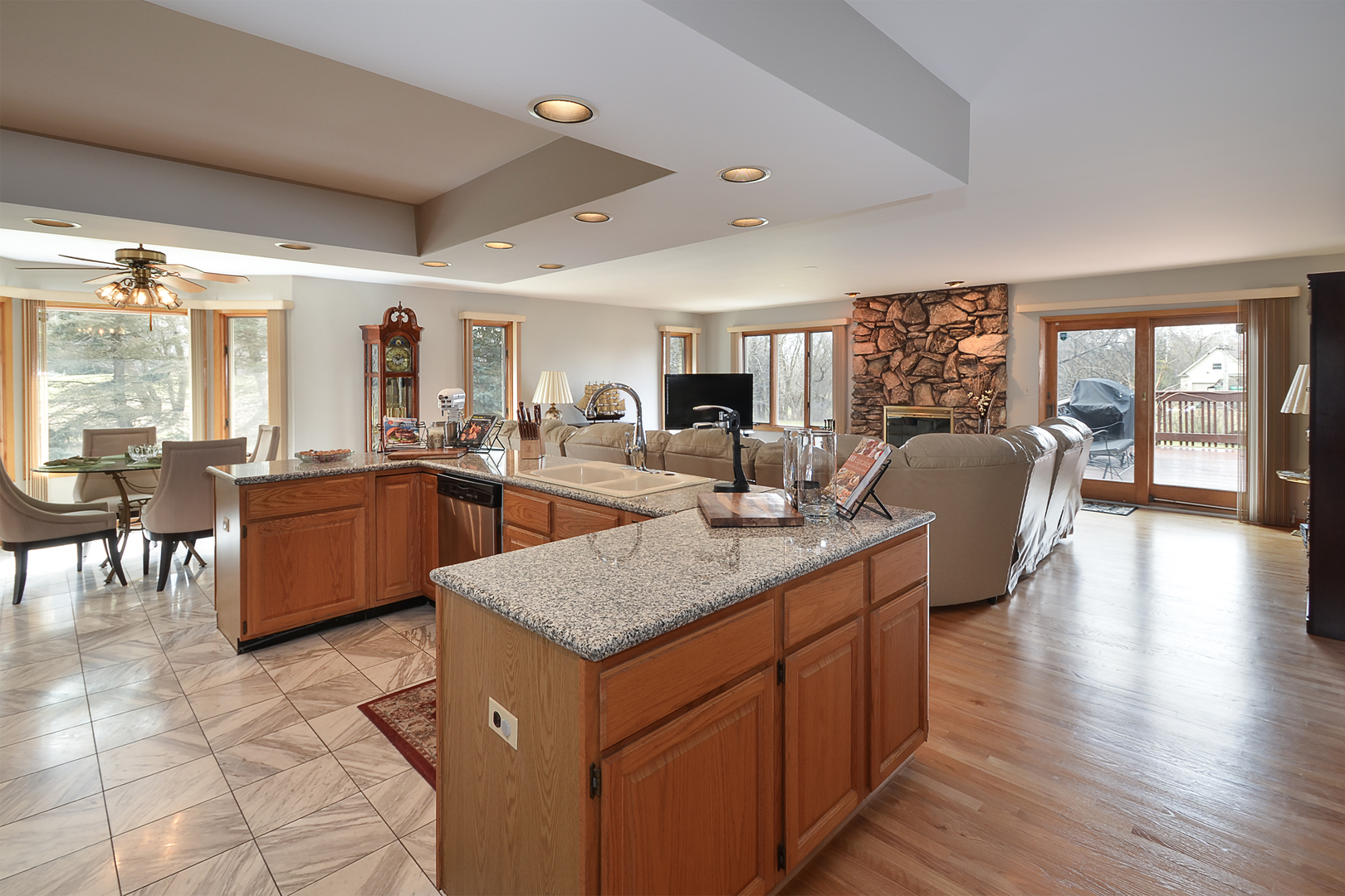 102 North Haman Road Inverness, IL 60010 - Photo 5 of 25 a dining hall with stainless steel appliances granite countertop a granite counter tops chairs and a view of living room