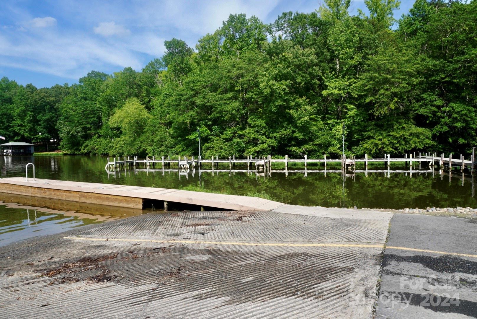 1025 Fairfield Road Mount Gilead, NC 27306 - Photo 7 of 12 a view of lake with a big yard