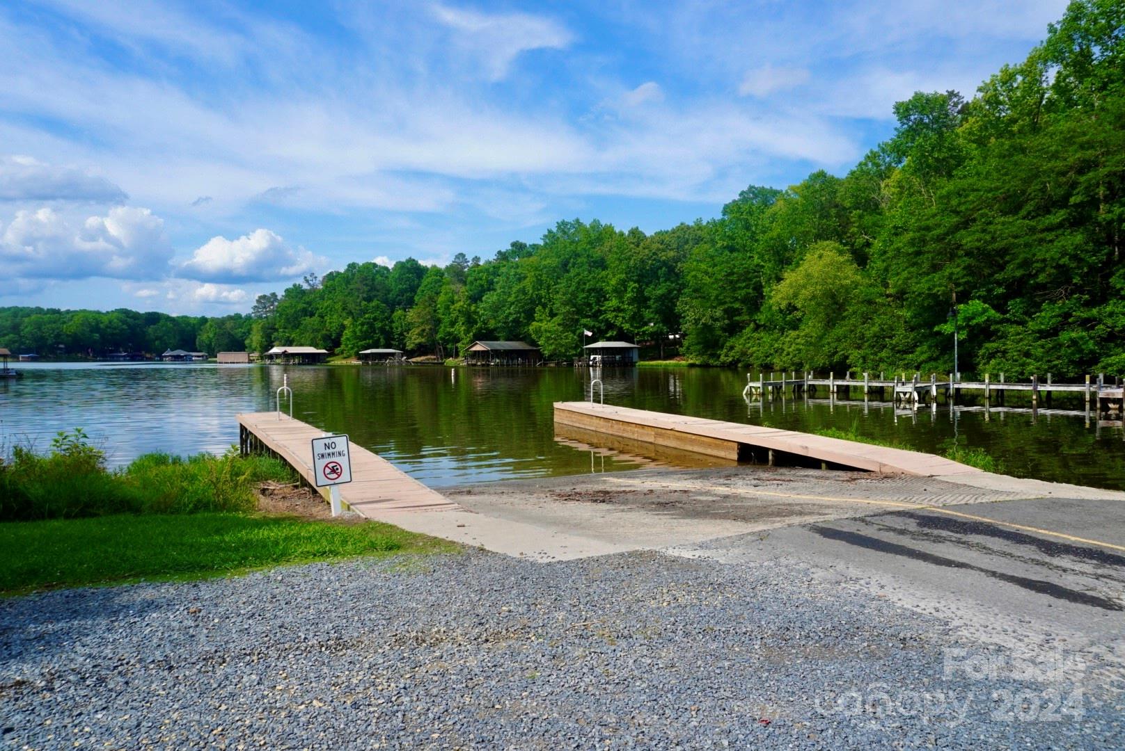 1025 Fairfield Road Mount Gilead, NC 27306 - Photo 9 of 12 a view of a lake with a park