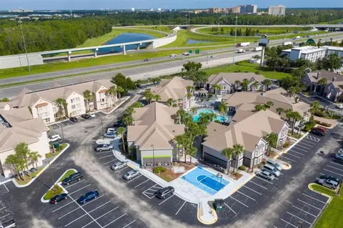 an aerial view of a house with a garden