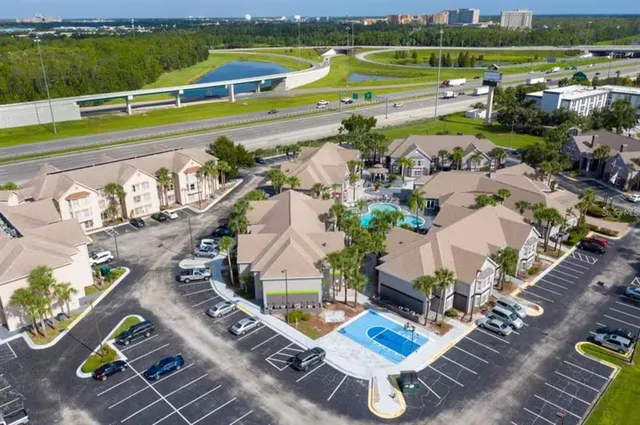 an aerial view of a house with a garden