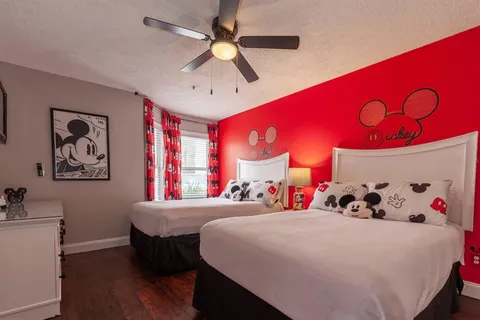 a bed room with a bed and a window