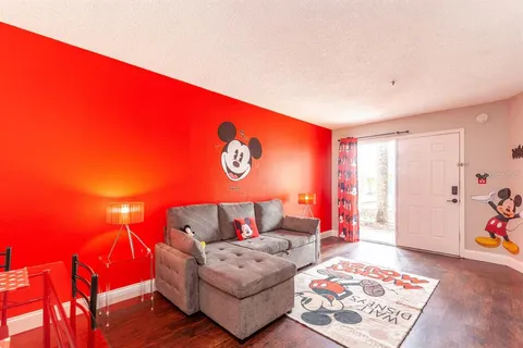 a living room with furniture and a table
